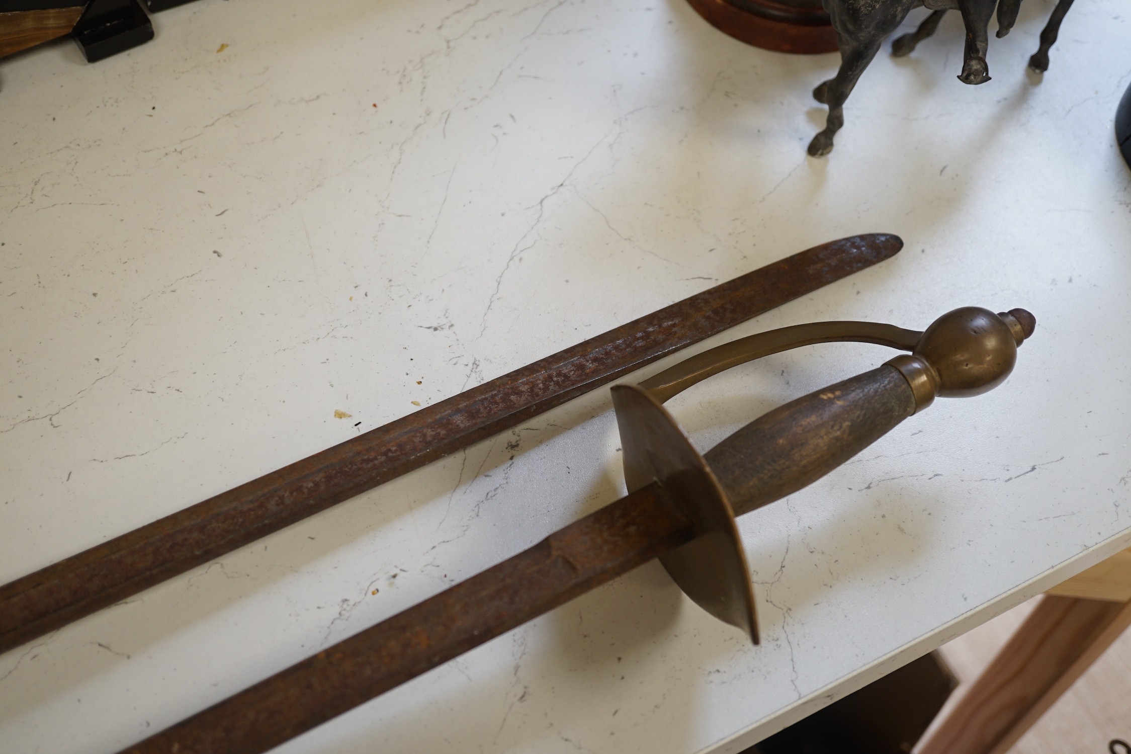 Two swords with bronze hilts